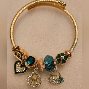 Elegant Gold and Green Charm Bracelet